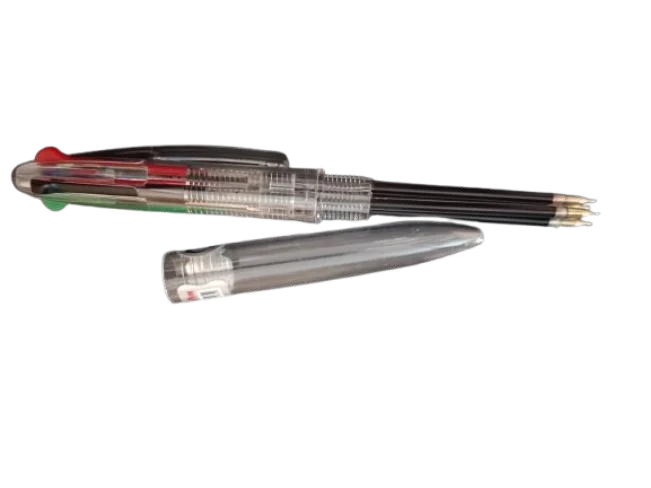 A multi color pen dismantled with its refills laid out