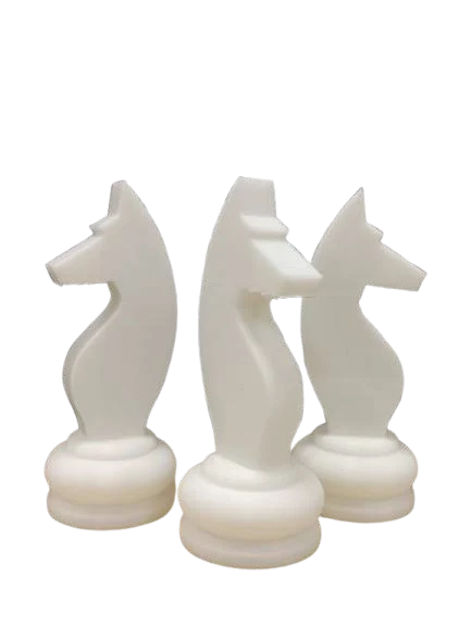 Three white 3D printed chess knights on a round base