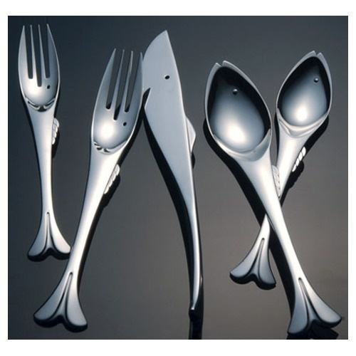 Sculptural silver cutlery with organic handles