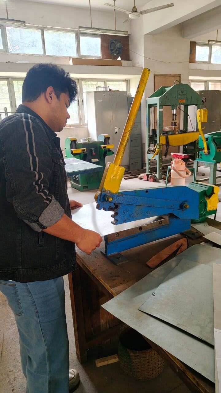 Cutting sheet metal on a bench shear