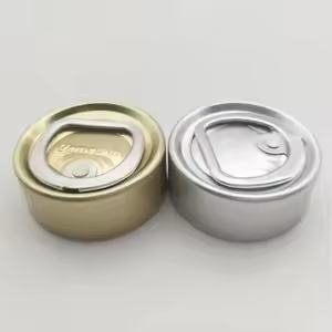 Two round metal tins with pull tabs